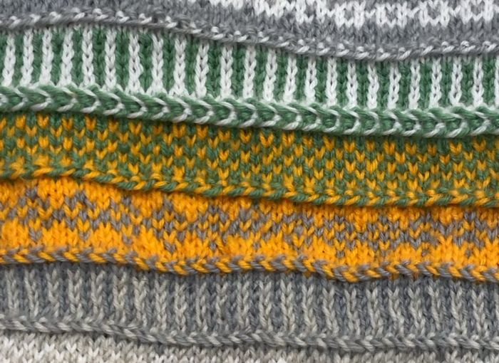 ラトビアンブレイドの編み地。2色の糸をねじりながら編むことで、三つ編み状の立体的な模様が浮かび上がる
